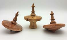 Hand turned wooden spinning tops