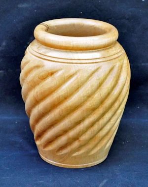Handmade wooden hollow form with spiral design