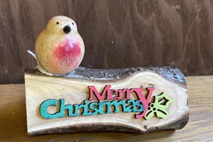 Robin on log decorations