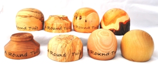 Turned wooden paperweights