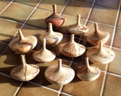 Hand turned wooden spinning tops