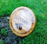 Ollie's oak plaque