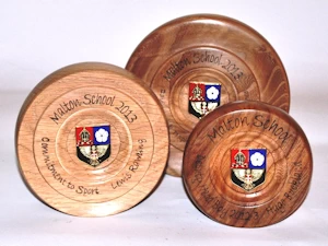 Individual turned wooden trophies
