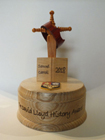 Hand crafted history trophy in wood